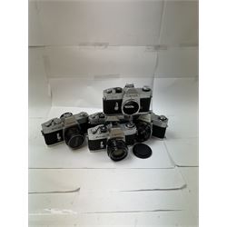 Five Canon SLR camera bodies all in silver and black finish, to include TX serial no. 144016, FX serial no. 210103, EX EE serial no. 136634 and two EX Autos, serial nos. 134020 & 157688, three with Canon 50mm 1:18 lenses