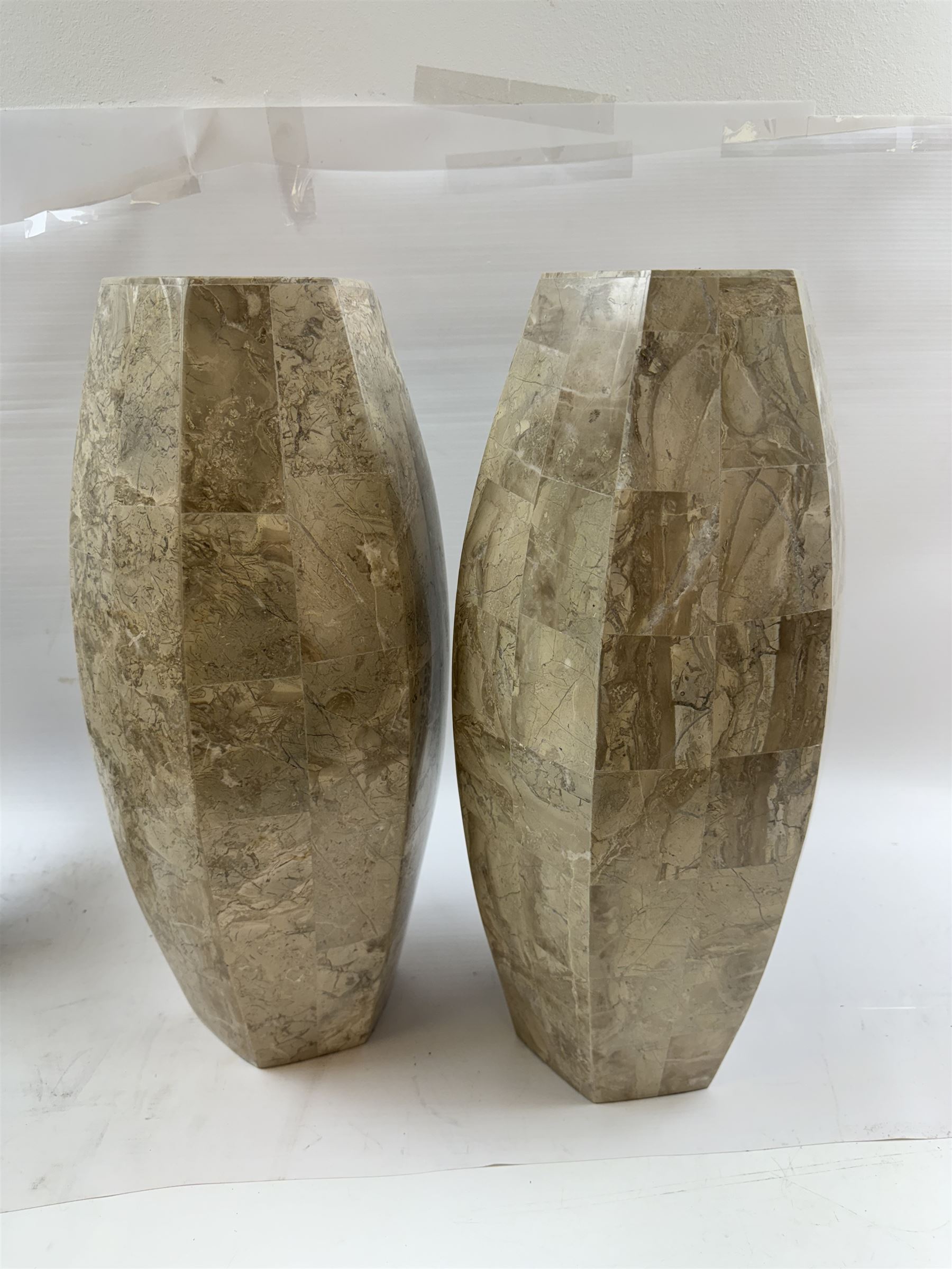 Pair of fossilised coral mosaic vases, of hexagonal form, H46cm