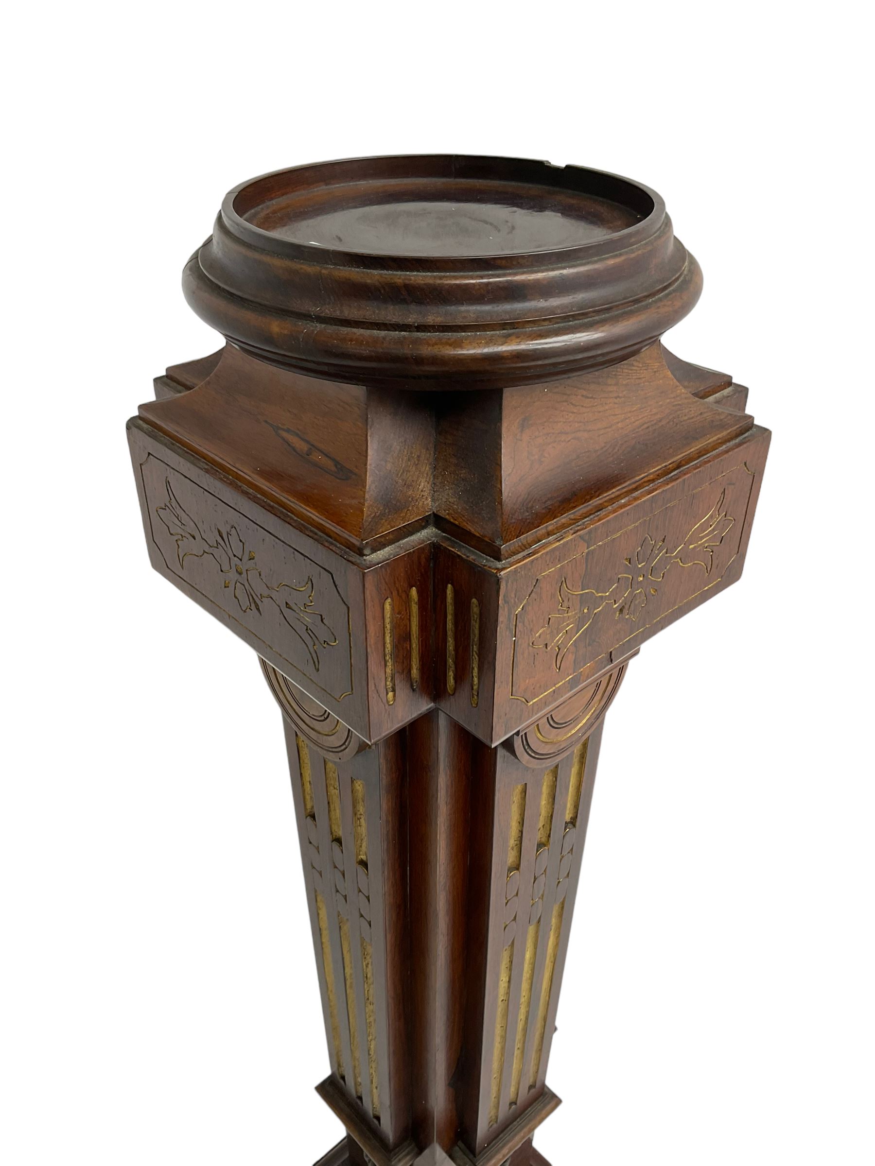 Late Victorian rosewood torchère, with carved and gilt decoration, fluted tapering column, stepped moulded plinth base, plaque underneath 'Urquhart & Adamson, Liverpool', hand written 'Mr. Jacobs',