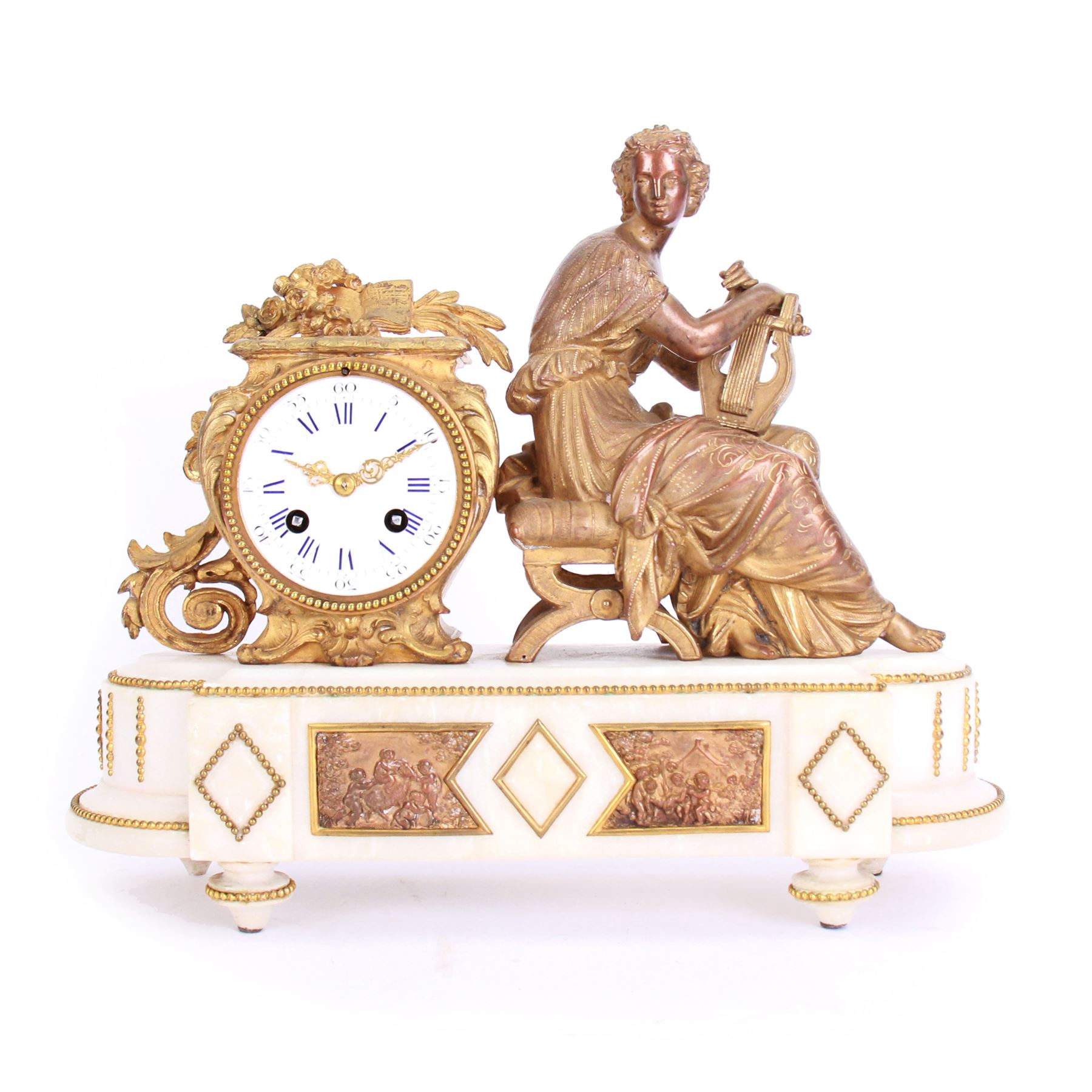 French - late 19th century 8-day figural mantle clock c 1880, with a breakfront alabaster plinth raised on four conforming feet, with two recessed and three raised lozenge panels, continuous bead decoration and a cast gilt figure of a seated female playing a Lyre,  Parisian drum movement with an enamel dial and Roman numerals, five-minute Arabic's and gilt Louis XVI hands, twin train countwheel striking movement, striking the hours and half-hours on a bell. With Pendulum. 