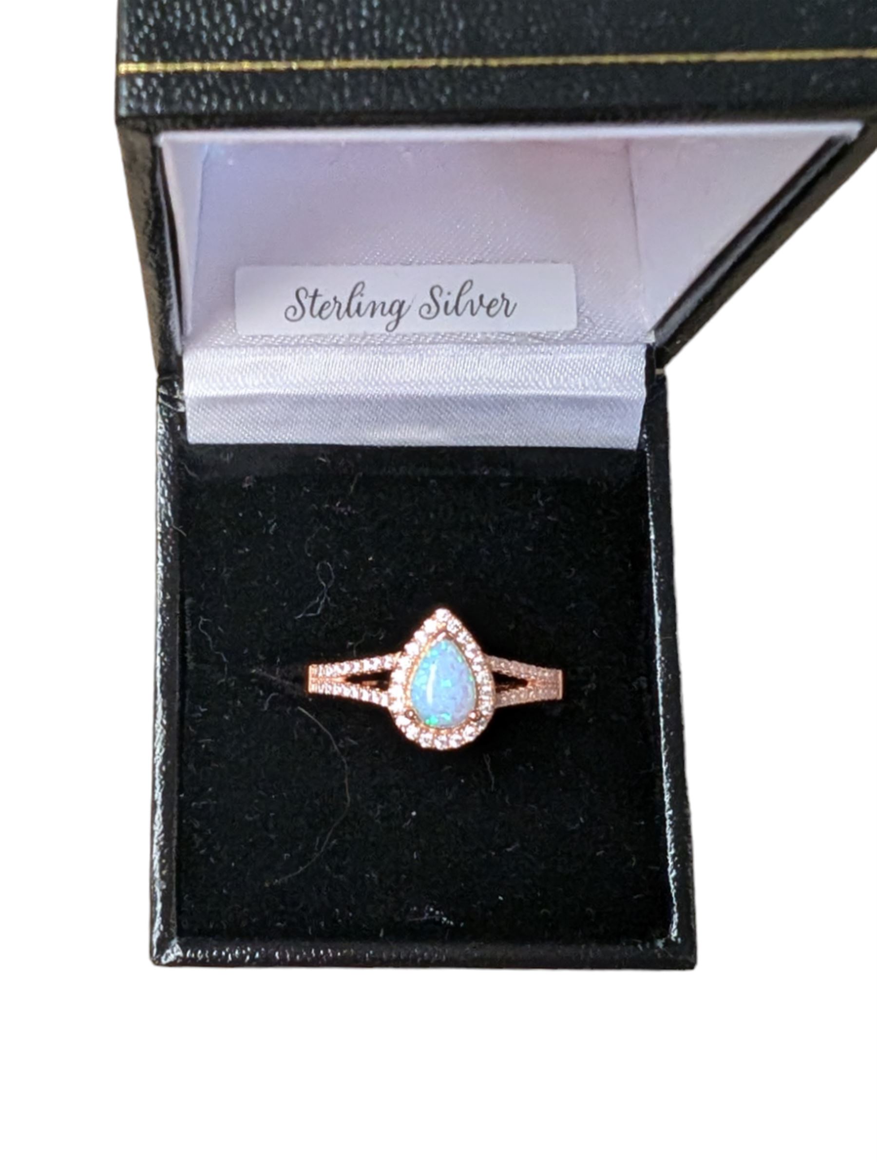 Silver-gilt pear shaped opal and cubic zirconia ring, stamped and boxed