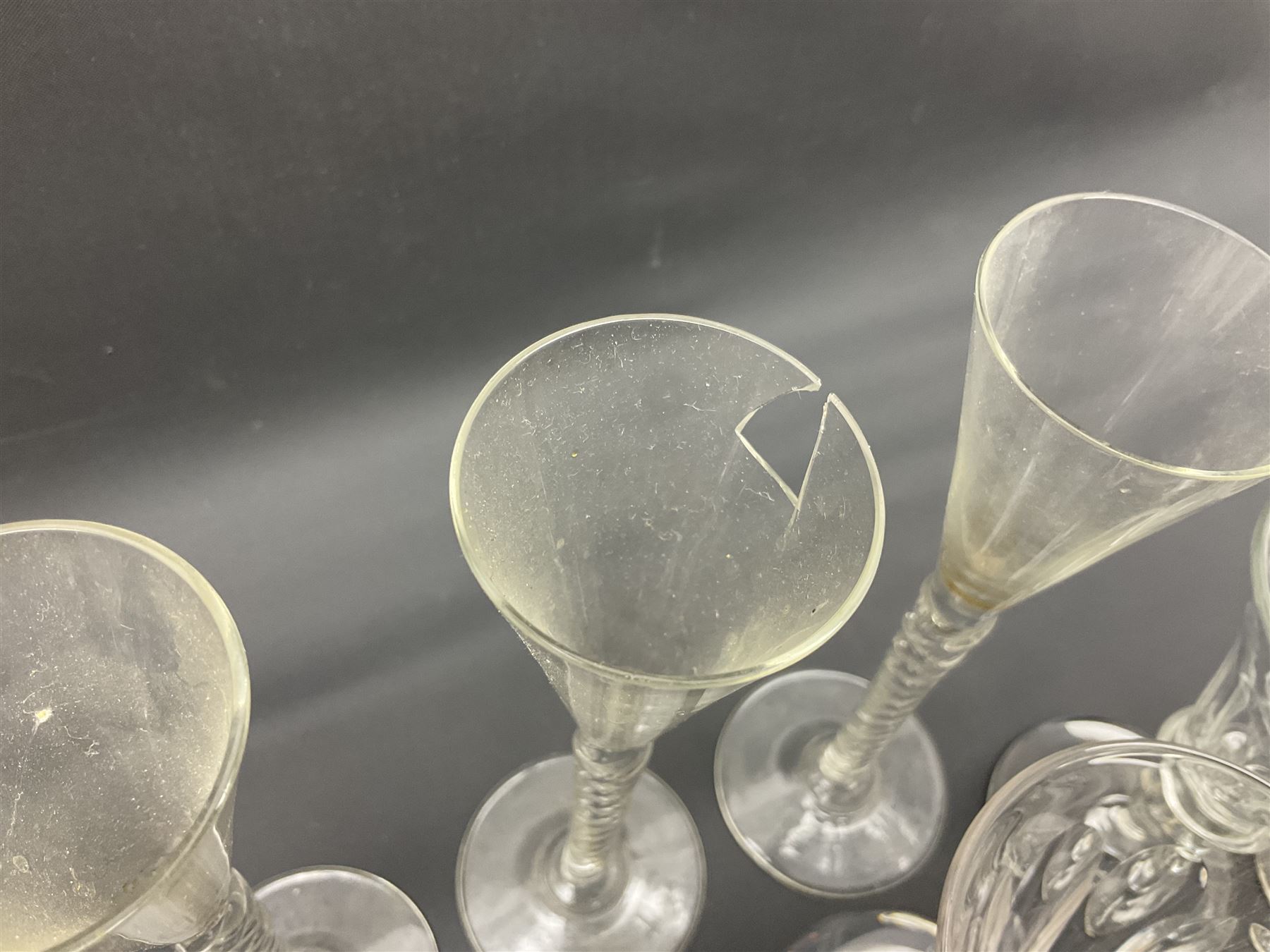 Collection of 18th century and later glassware, including set of three with twist stems and etched and fluted examples