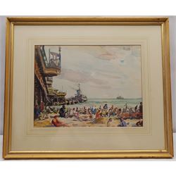 George Herbert Buckingham Holland (British 1901-1987): Figures on Bournemouth Beach with a Steamer docked at the Pier, watercolour signed and dated ‘77, 28cm x 37cm