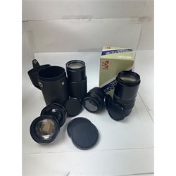 Group of camera lenses, comprising Yashica AF 70-210mm 1:4.5 58mm lens serial no. F6106983, boxed, Yashica AF 35-70mm 1:3.3-4.5 52mm Macro lens serial no. F60231147, Yashikor Aux Wide Angle 1:4 lens and a Yashikor Aux Tele-Photo 1:4 lens, Mamiya-Sekor E 1:2.8 f=28mm serial no. 13427 and a Mamiya-Sekor Zoom E 1:4 f=80-200mm lens serial no. 11271