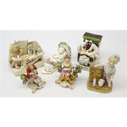  Pair Samson porcelain figures, gold anchor mark, Victorian fairing and Vienna porcelain model of a baby in crib and two continental figures (6)  
