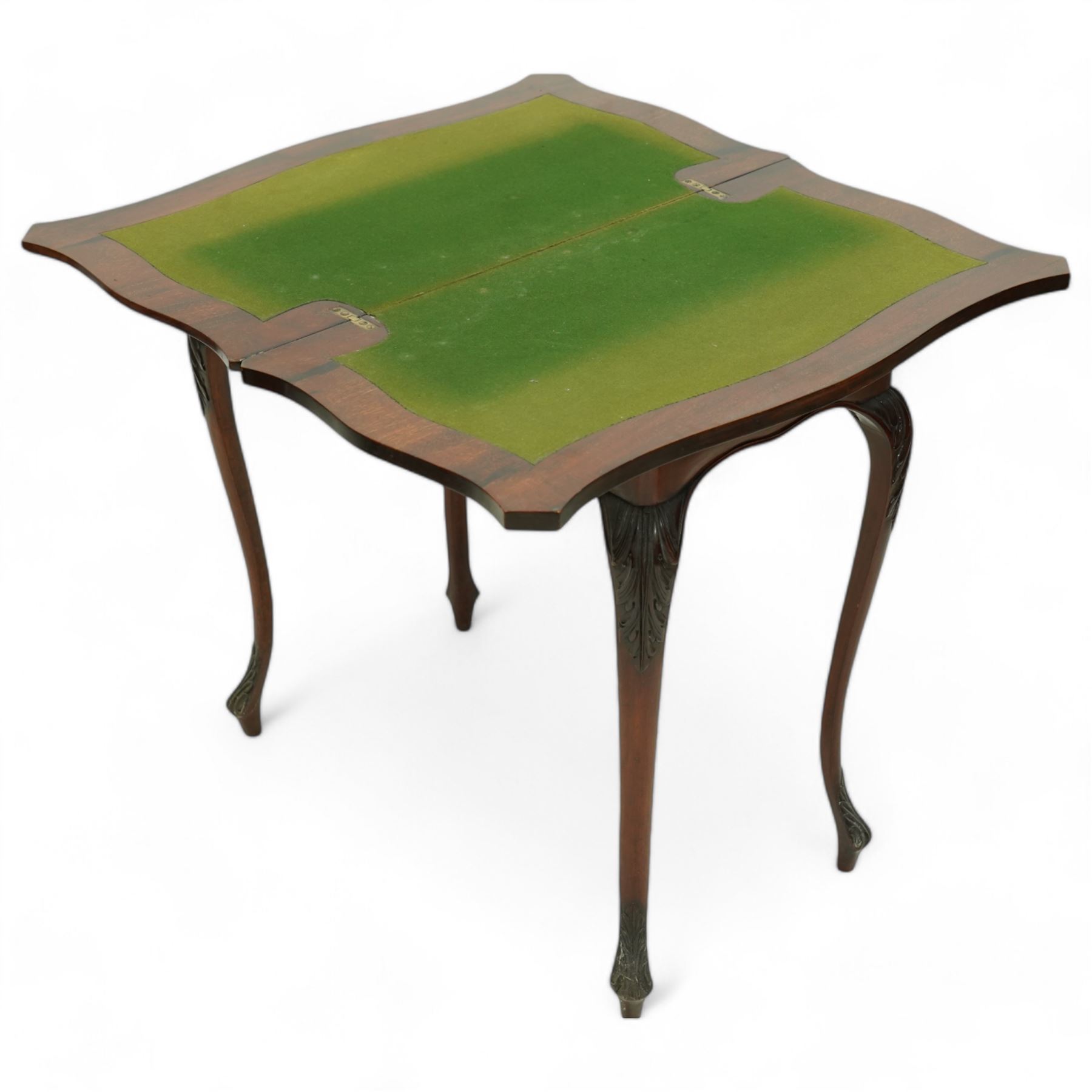 Victorian mahogany card table, shaped and moulded fold-over swivel top, opening to reveal baize playing surface, scrolled acanthus leaf carved frieze rail, on acanthus carved cabriole supports 