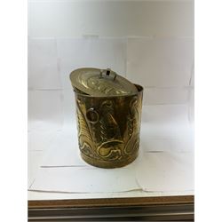 Arts and Craft brass coal box of cylindrical, with embossed stylised leaf panels, with twin handles, the cover with triform handle, H42cm 