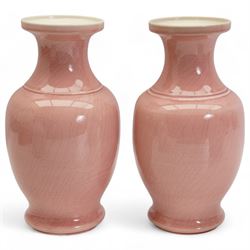 Two Chinese Provincial blue and white ginger jars, one with associated cover, H18cm, together with a pair of pink glazed baluster vases (4)