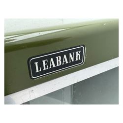 Mid-20th century 'Leabank' metal display cabinet, two sliding glass doors enclosing two adjustable metal shelves, olive green finish with chrome trim