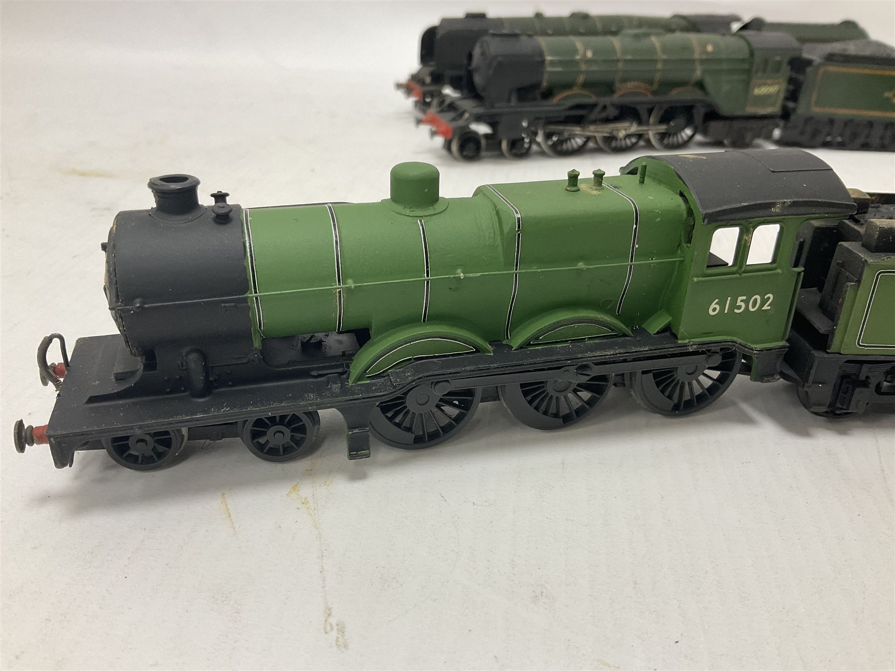 ‘00’ gauge - four hand built locomotives, using various Hornby parts, comprising Duchess Class 4-6-2 ‘City of Glasgow’ no.46242 in BR green; Class A3 4-6-0 ‘Humdrist’ no.60097 in BR green; Class B12 4-6-0 no.61502 in BR green; M7 Class 0-4-4T no.245 in southern green; with Hornby tender in BR green (5) 