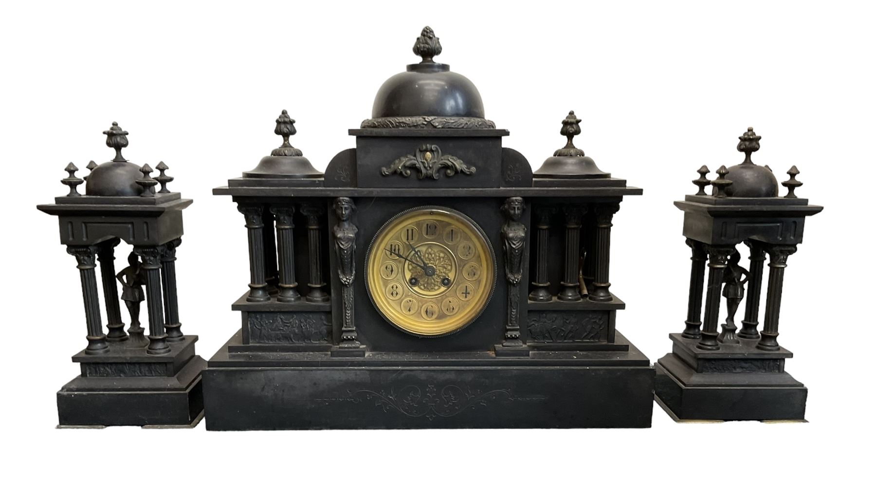 French - late 19th century Belgium slate 8-day mantle clock with conforming side temples, break front case with a central dome, recessed pilasters and a deep stepped plinth, glazed bezel with a brass dial, Arabic numerals and decorated centre, gong striking twin train movement with pendulum and key.