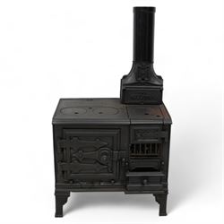 'The Holloway' cast iron portable range stove, fitted with surface burners and oven, on angular bracket feet 