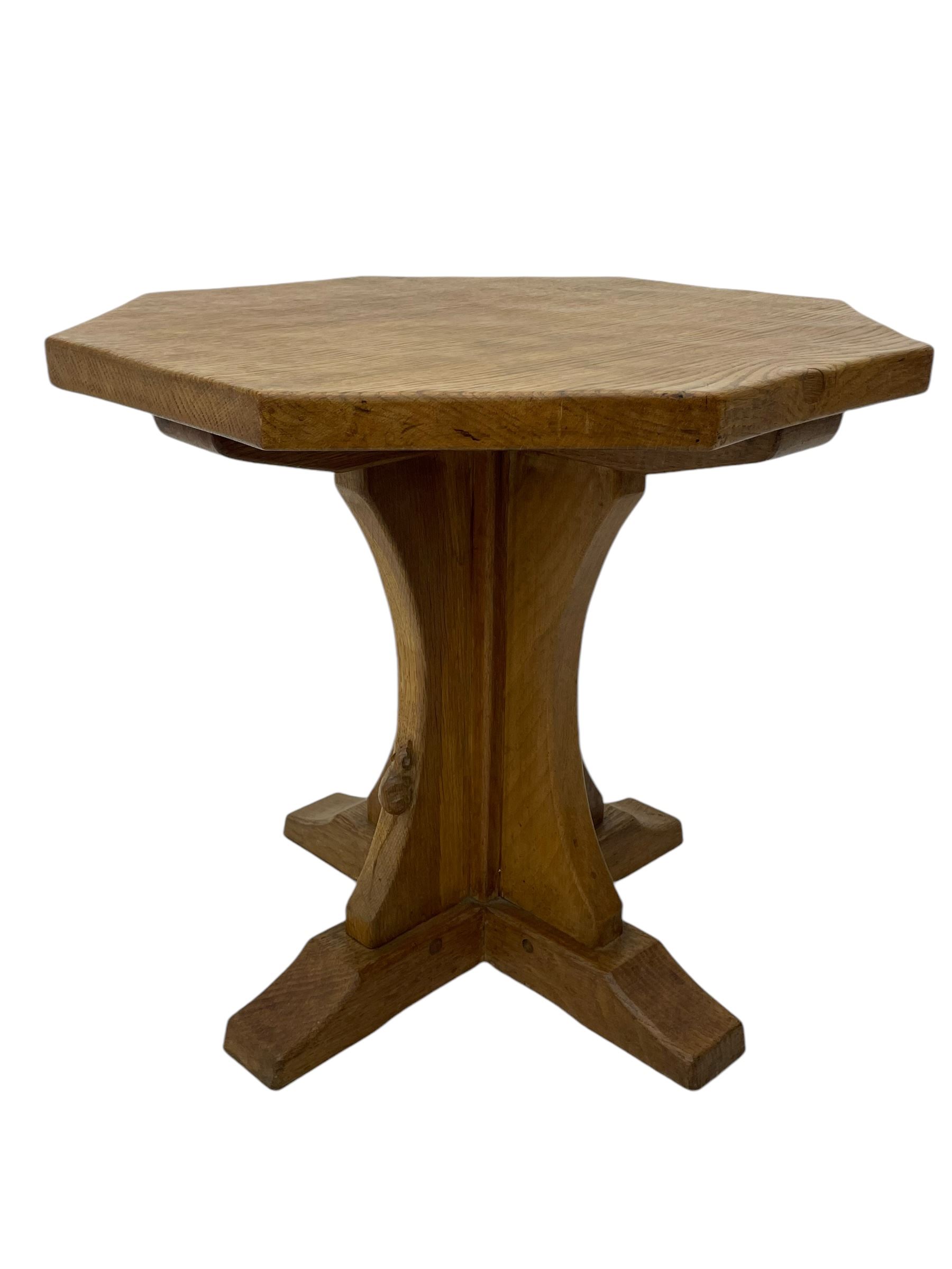 Mouseman - oak occasional table, octagonal adzed top, cruciform pedestal on sledge feet, carved with mouse signature, by the workshop of Robert Thompson, Kilburn 