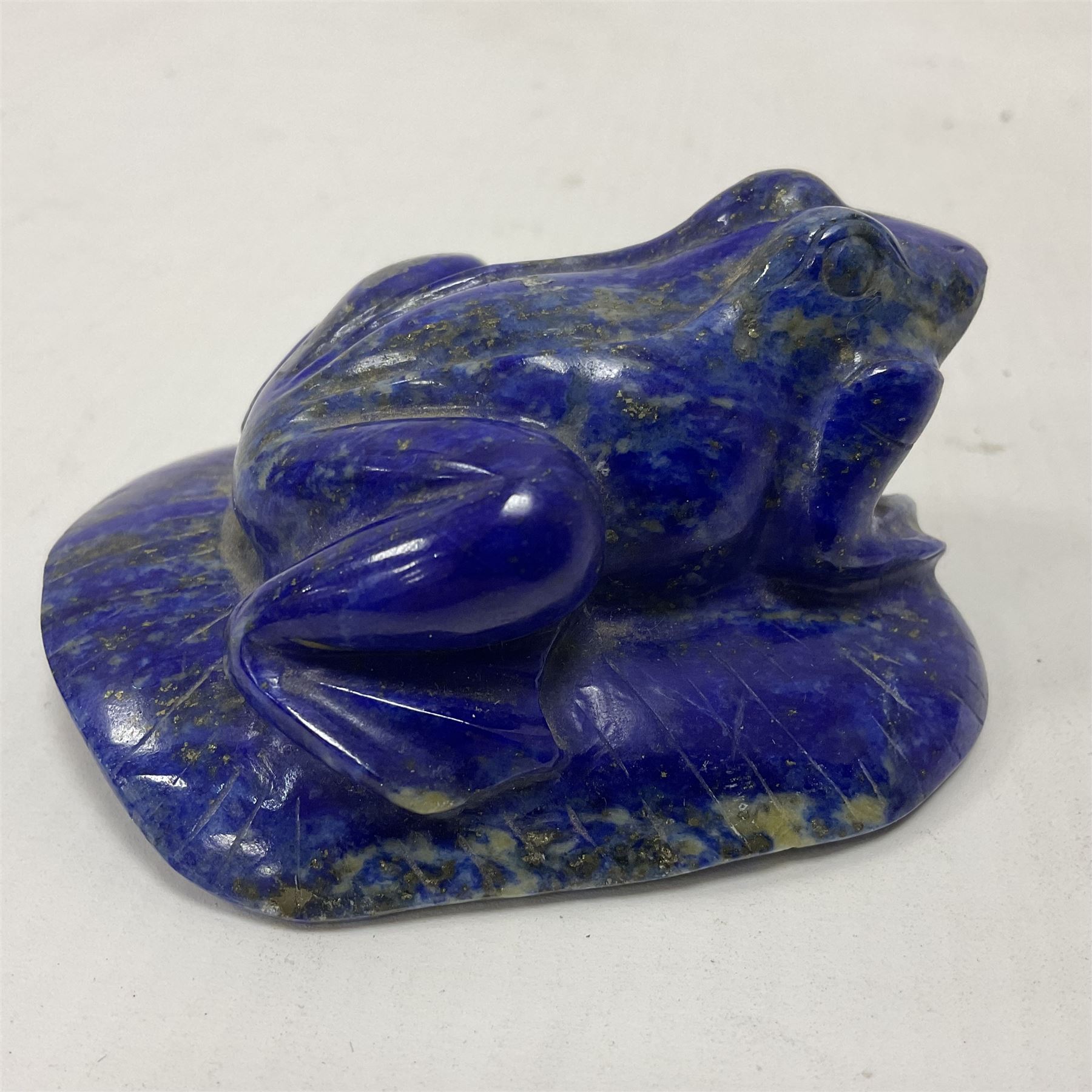 Carved Lapis lazuli carved figure of a frog on a lillypad, H3cm, L8cm