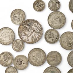 Approximately 400 grams of Great British pre 1947 silver coins, including shillings, halfcrowns, King George V 1935 crown etc