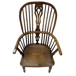 19th century yew wood and elm Windsor chair, high hoop and stick back with pierced splat over dished seat, raised on ring turned supports united by crinoline stretcher