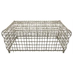 White metal coffee table, rectangular form with rolled edges