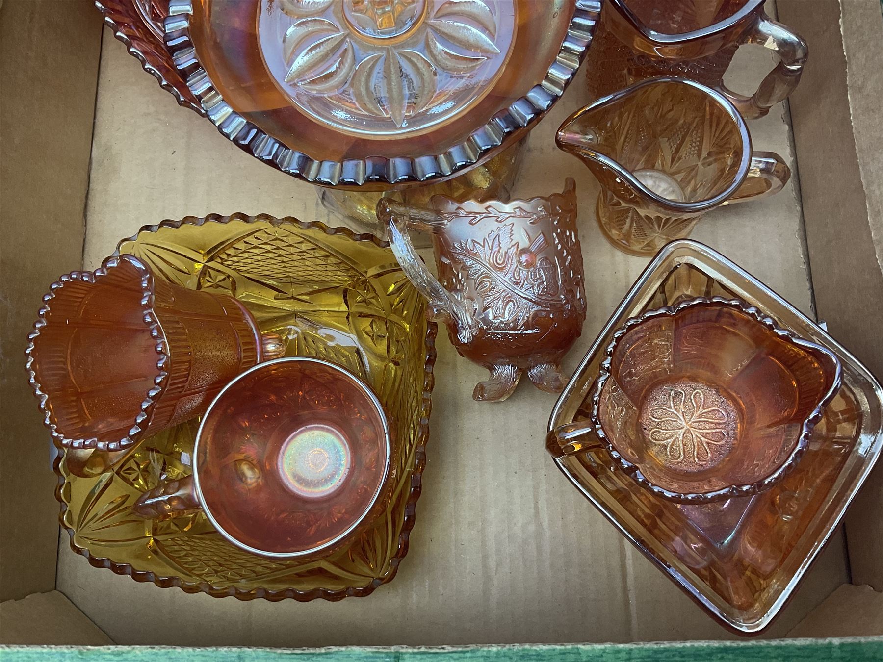 Collection of orange carnival glass, including jugs, dishes, vases etc, in two boxes 