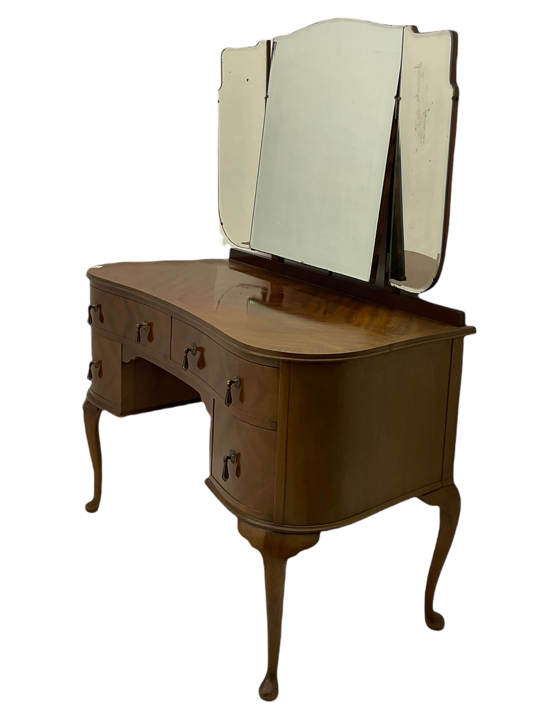 Mid-20th century kidney shaped mahogany dressing table, raised triple mirror back, fitted with four drawers, on cabriole supports