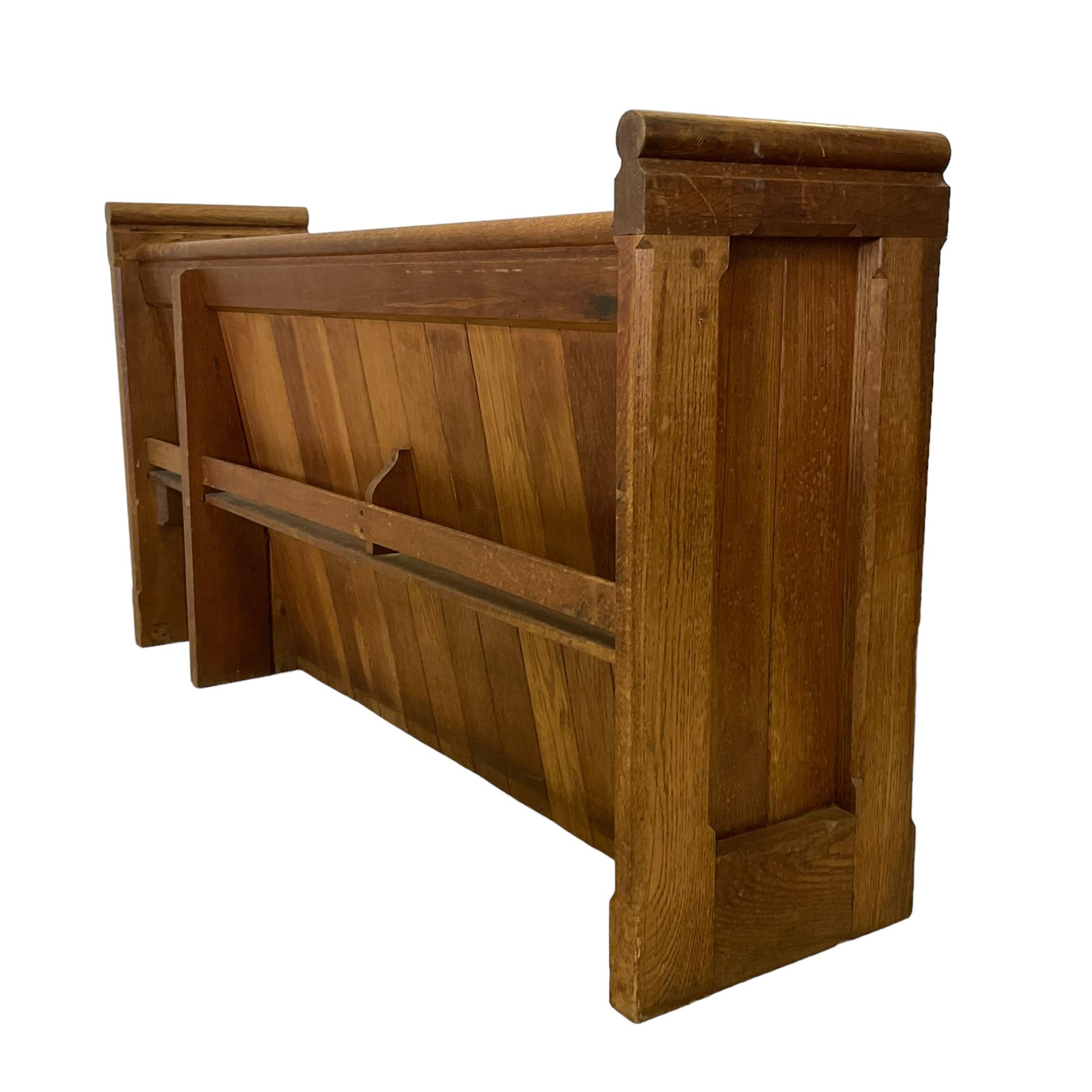 19th century oak church pew or hall bench, moulded cresting rail over panelled back and plank seat, on panelled end supports with chamfered frames