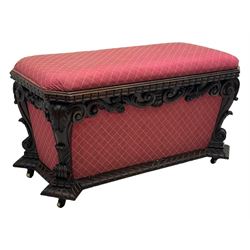 19th century rosewood and simulated rosewood ottoman footstool, tapering canted rectangular form enclosed by hinged lid, upholstered in red fabric, the frieze decorated with scrolling leaves, each corner with scrolled acanthus leaf supports, projecting shallow gadroon moulded edge 