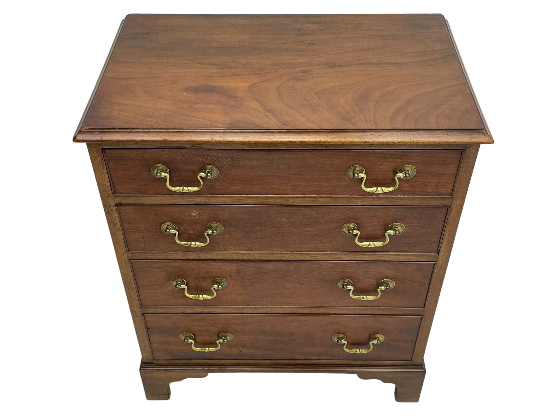 Small Georgian and later mahogany chest, moulded rectangular top over four long cock-beaded drawers, on bracket feet