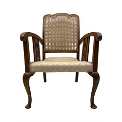 Early 20th century beech framed chair, with scalloped caned backrest, curved arms with pierced splats, upholstered seat in light pink fabric with gold trim, on cabriole supports