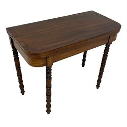 Early 19th century mahogany tea table, rectangular fold-over top with rounded corners, inlaid with mahogany banding, the plain frieze with mahogany stringing, raised on gate-leg action ring turned supports