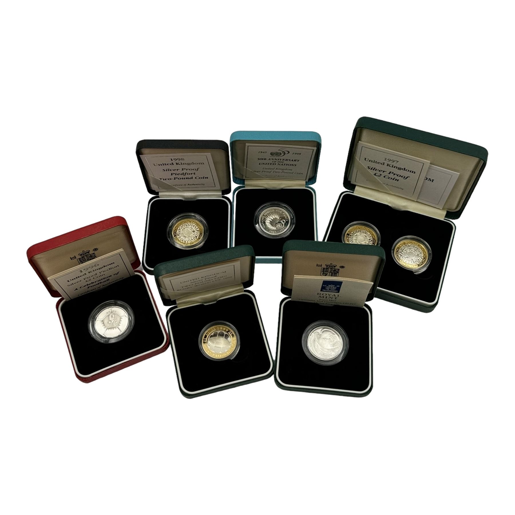 Six The Royal Mint United Kingdom silver proof two pound coins or sets, comprising 1995 '50th Anniversary of the United Nations', 1995 'Second World War', 1996 'A Celebration of Football', '1997 - 1998' two coin set, 1998 piedfort and 1999 'Rugby World Cup', all cased with certificates