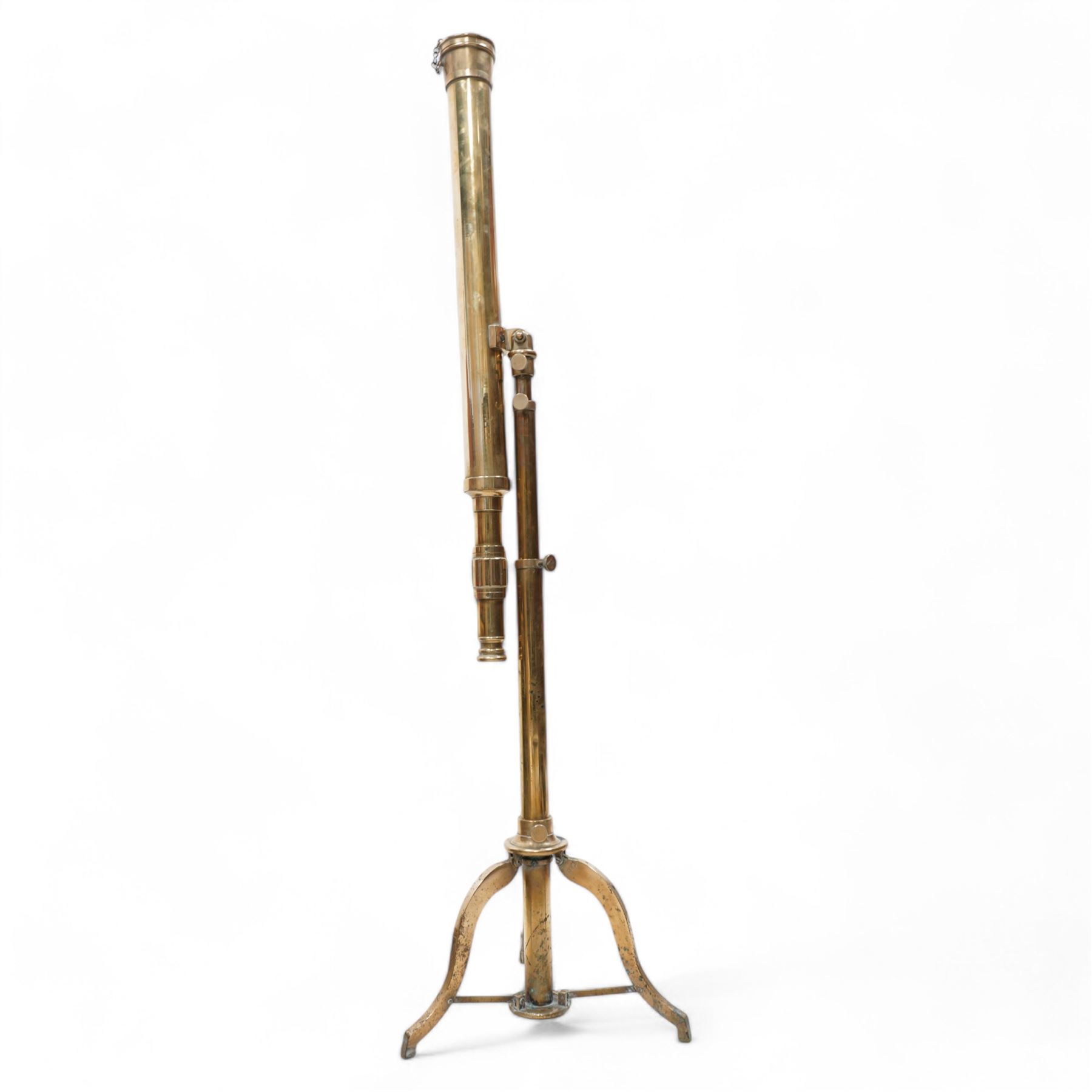 19th century lacquered brass telescope, the barrel on telescopic stem and tripod stand 