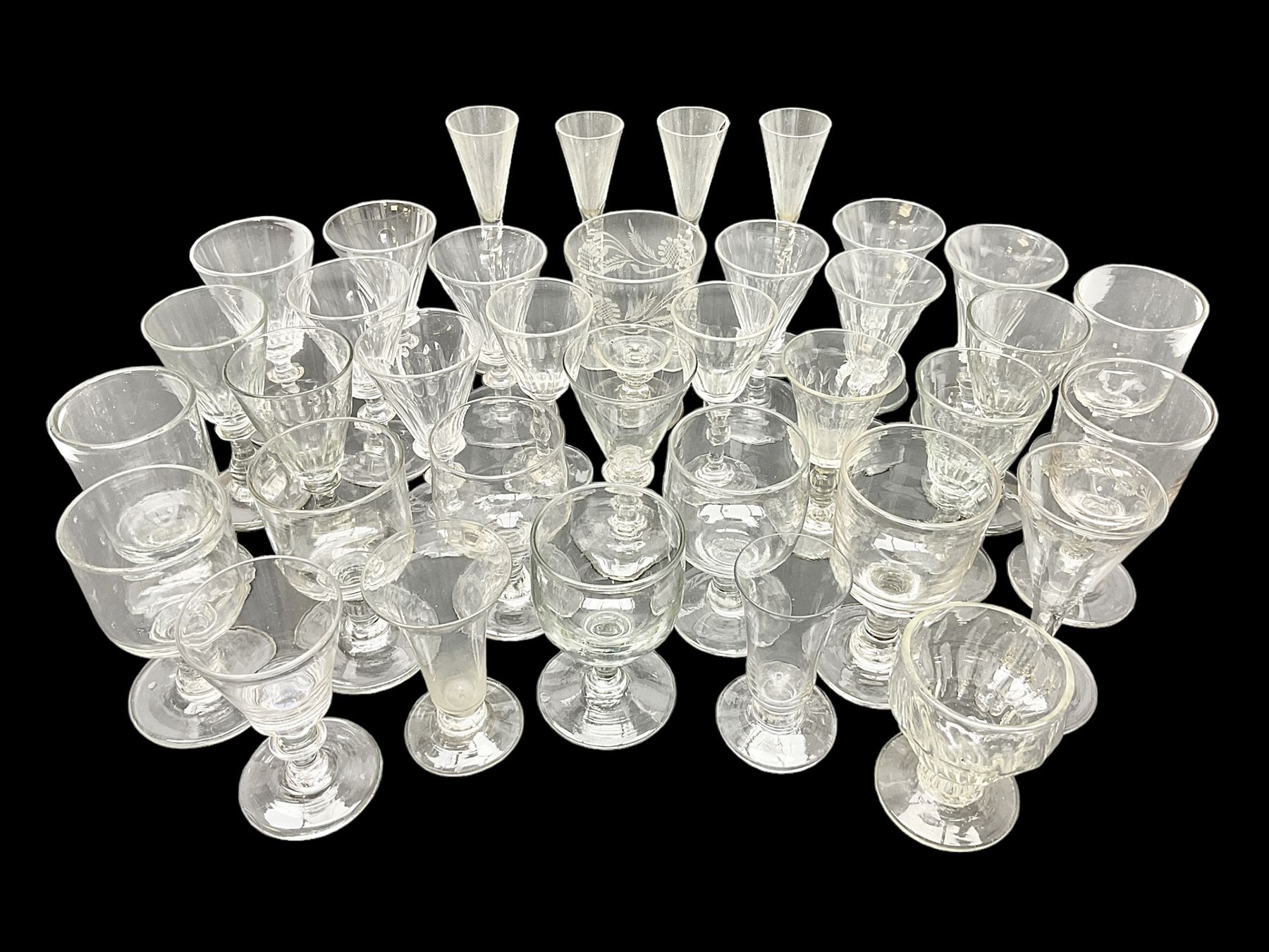 Collection of 18th century and later glassware, including set of three with twist stems and etched and fluted examples