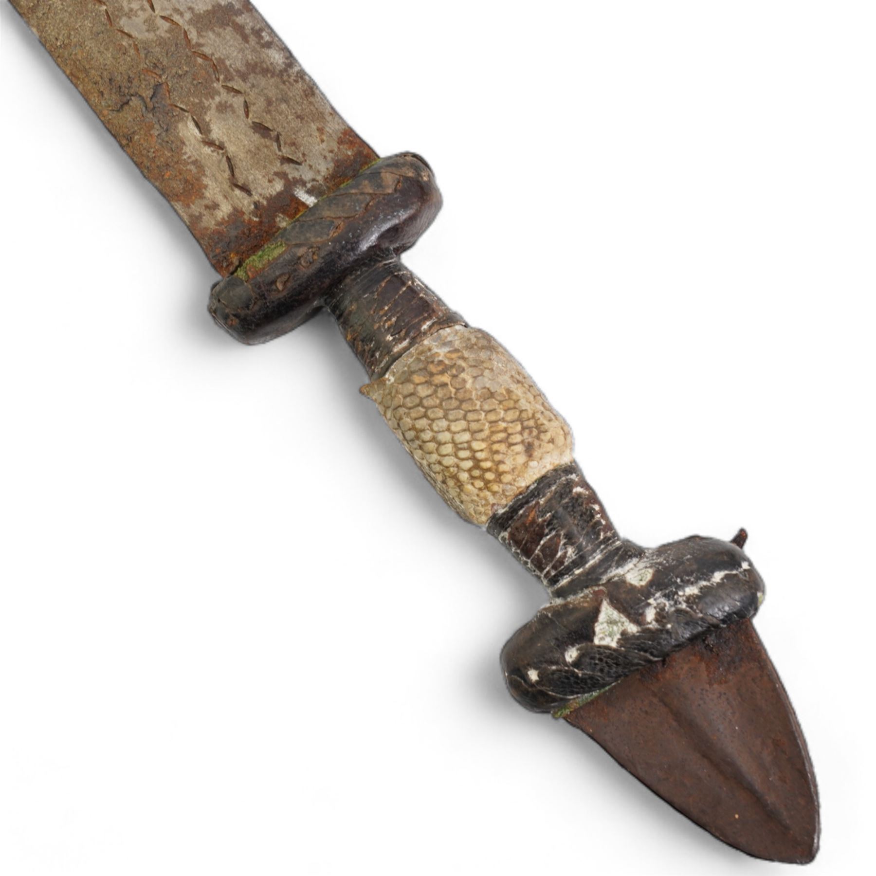 North African arm dagger with leather scabbard, blade length 19cm and a South American hunting knife, the ricasso marked 'Rio Branco', blade length 18cm (2) 