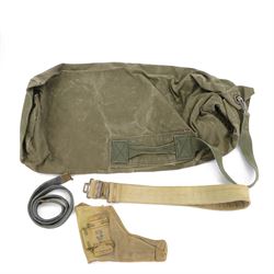 Canvas army kit bag, together with canvus officers pistol holster, and two belts