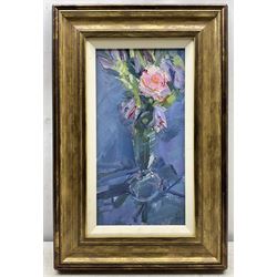 Don McKinlay (British 1929-2017): Still Life of Pink Rose, oil on board signed with initials 36cm x 18cm