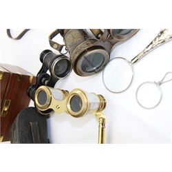 Pair of brass and mother of pearl opera glasses, together with a gilt metal pair of racing binoculars and one other pair, etc 