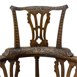 Elm 'Windsor' splat back corner armchair, shaped cresting rail carved with leaves over shaped and pierced splat, the curved arms carved with foliage and scrolled terminals, turned upper supports and a further two splats, panelled seat within foliate carved seat rails, on square rear supports with front shell carved cabriole support, united by plain x-frame stretchers