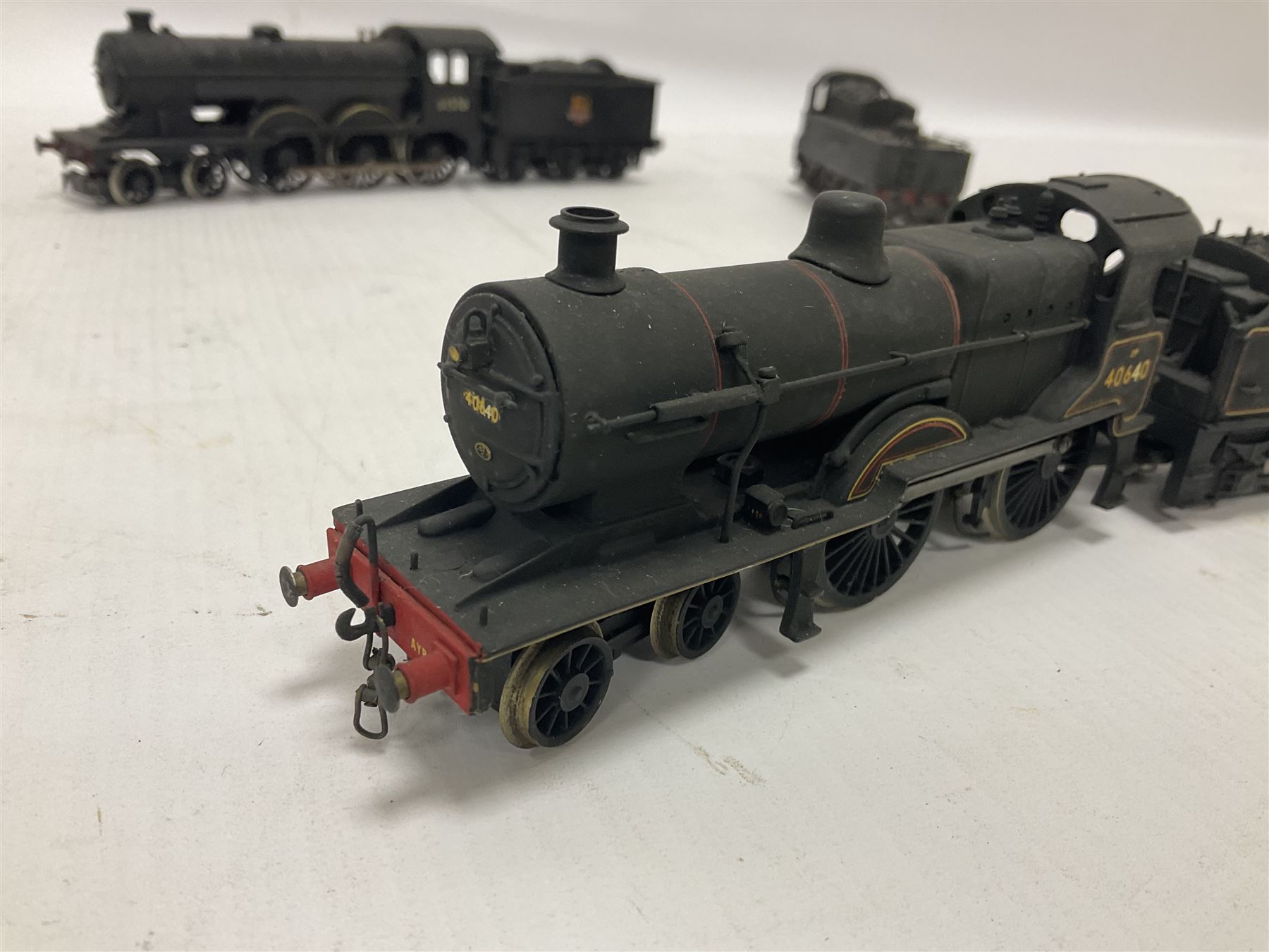 ‘00’ gauge - four hand built locomotives, using various Hornby parts, comprising B12 Class 4-6-0 locomotive no.61570 in BR black; Class 2P 4-4-0 locomotive no.40640 in BR black; Class D15 4-4-0 ‘Claud Hamilton’ locomotive no.62546 in BR black; Class J83 0-6-0T locomotive no.68453; one further hand built tender (5) 