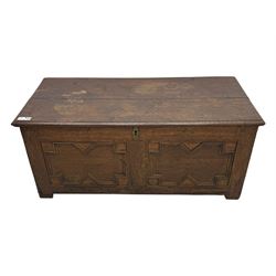 18th century oak blanket box, rectangular form with a hinged lid, the front decorated with...