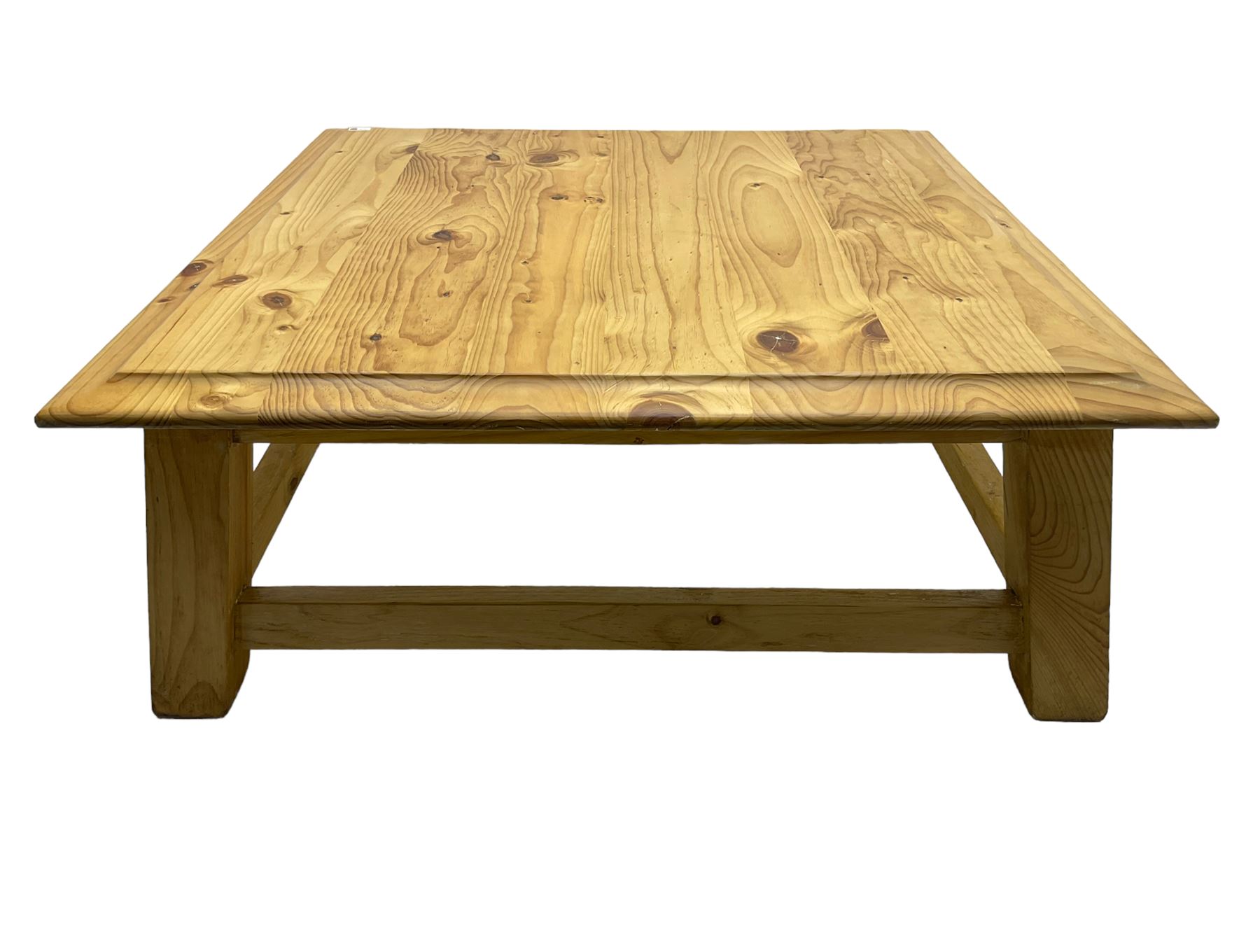 Pitch pine coffee table, moulded top square top raised on splayed supports united by box stretchers 