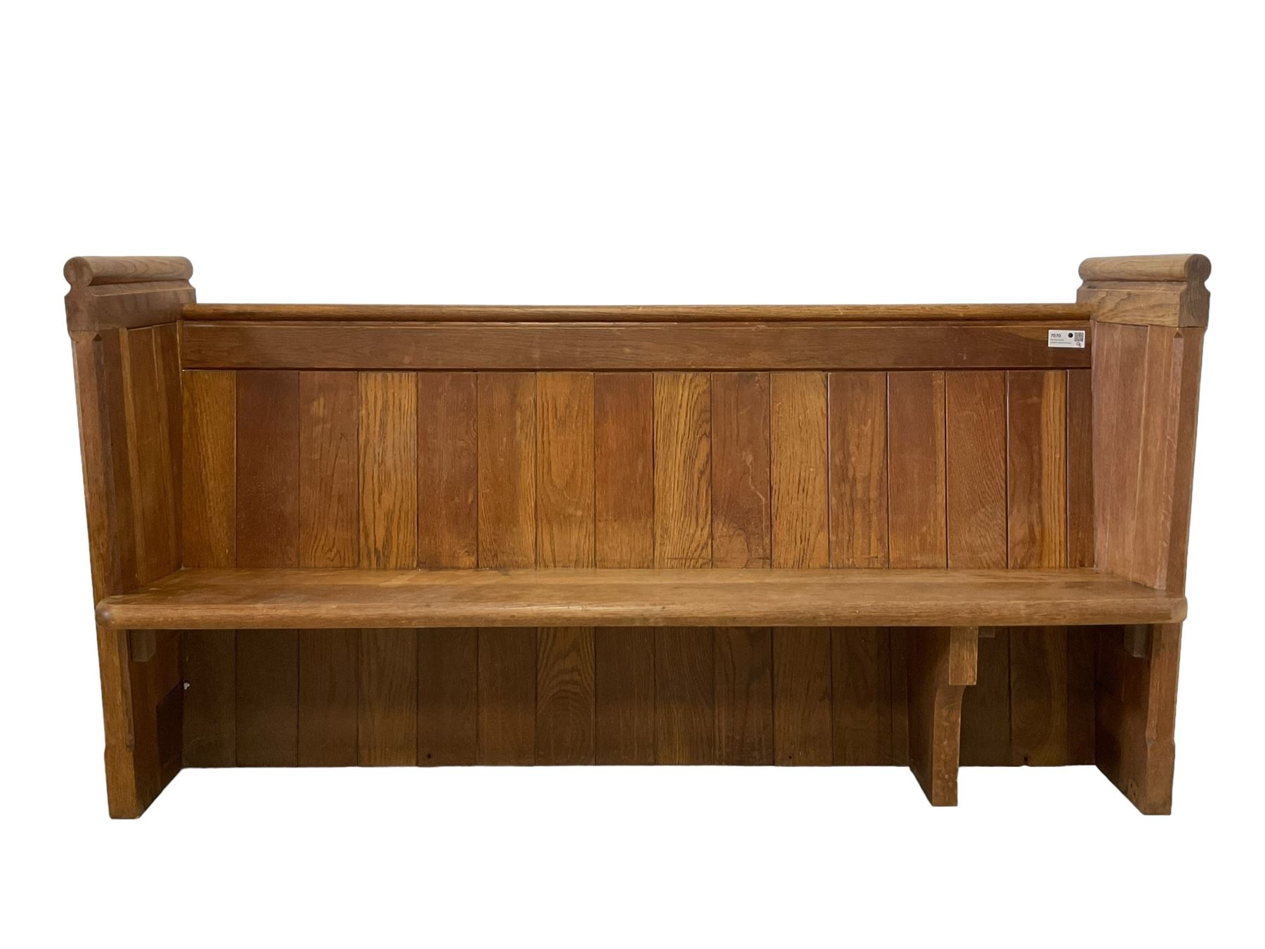 19th century oak church pew or hall bench, moulded cresting rail over panelled back and plank seat, on panelled end supports with chamfered frames