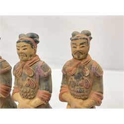 Set of three painted Chinese 'Terracotta Warrior' style figures, H20cm