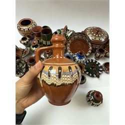 Collection of slipware, including miniature vases, baskets, candlesticks jugs etc 