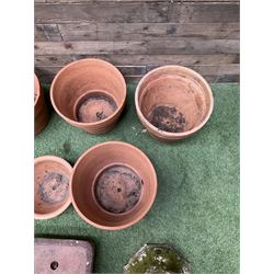 Set of five terracotta planters, small stone trough and urn plinth  - THIS LOT IS TO BE COLLECTED BY APPOINTMENT FROM DUGGLEBY STORAGE, GREAT HILL, EASTFIELD, SCARBOROUGH, YO11 3TX