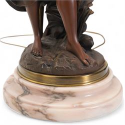 Pair of large bronzed resin figural table lamps, modelled as a young woman and cherub, issuing three naturalistic branches, entwined with flowering tendrils, with three frosted glass shades, on simulated marble base, H84cm (2)