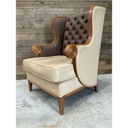 Walnut finish framed wing back armchair upholstered leather and buttoned fabric