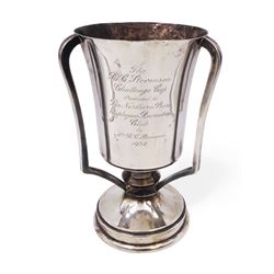 1930s silver three handled trophy, the tapering body inscribed with presentation engraving, upon stepped circular foot, hallmarked Grant & Son, Birmingham 1935, H22cm