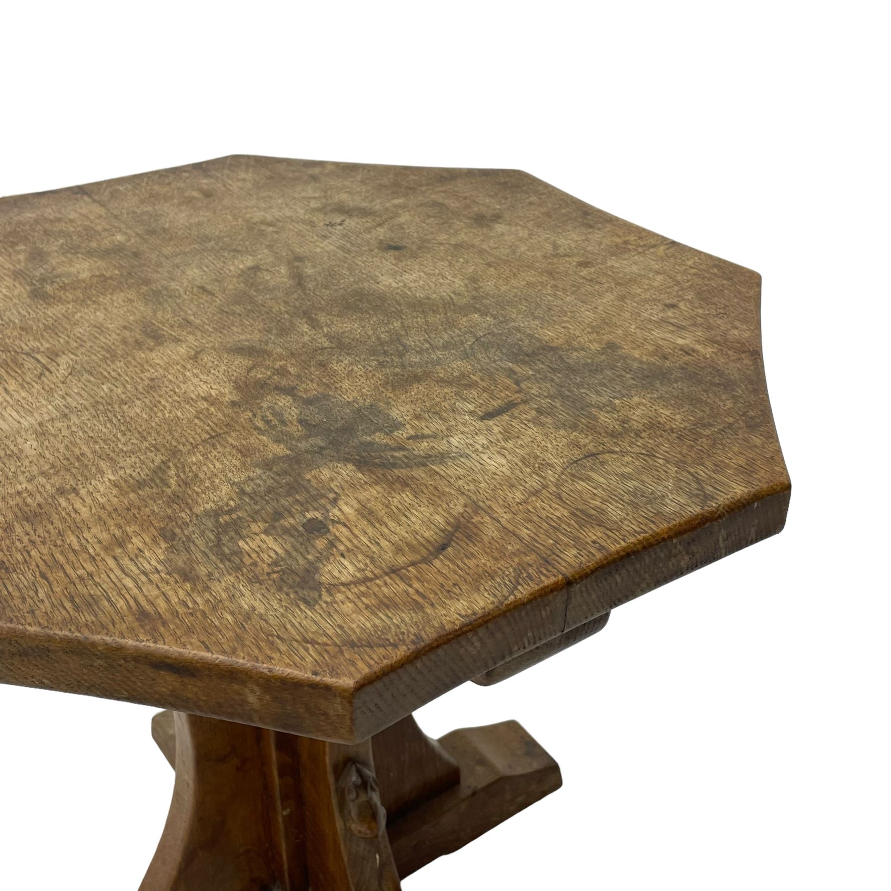 Mouseman - oak occasional table, octagonal adzed top, cruciform pedestal on sledge feet, carved with mouse signature, by the workshop of Robert Thompson, Kilburn 