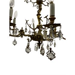 Gilt metal six branch ceiling light, the central stem modelled as a ballerina, decorated with glass pendants 