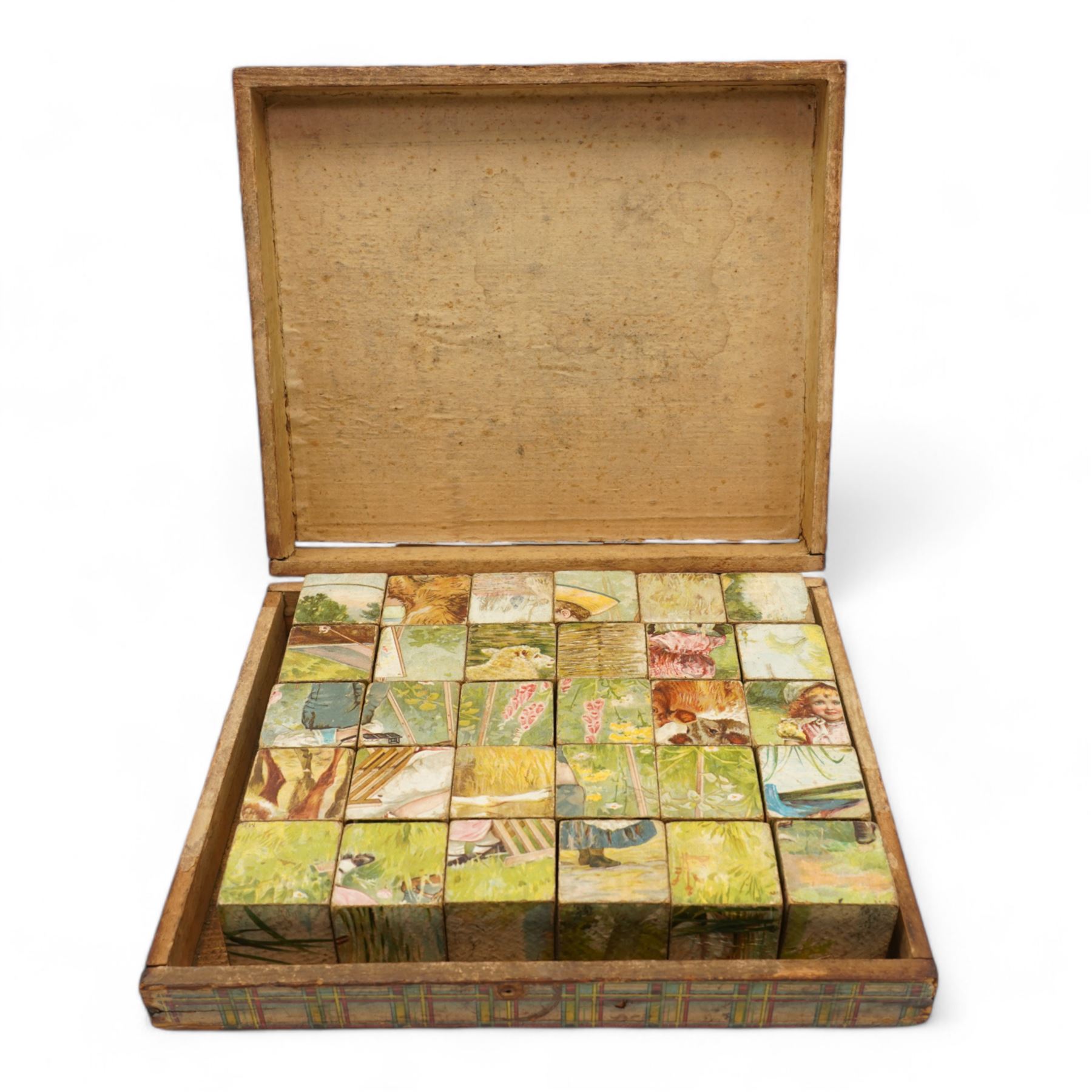 Early 20th century cube puzzle of children playing (boxed)