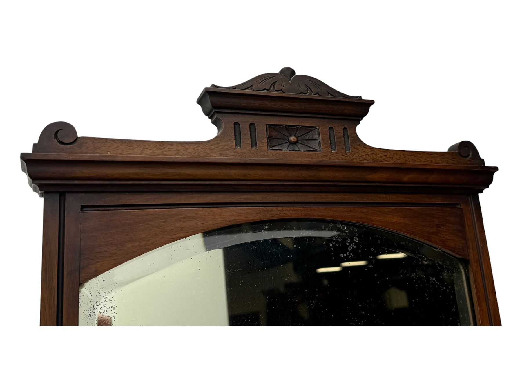 Late Victorian walnut dressing table, raised bevelled swing mirror over small trinket drawers, rectangular moulded top, fitted with two drawers, on turned supports united by undertier 